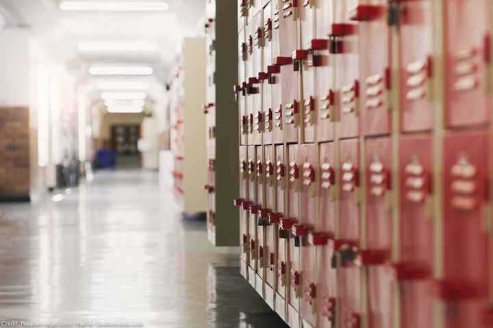 A shot of an empty corridor in a high school.