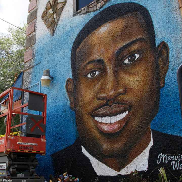 Painted mural of Ahmaud Arbery in Brunswick, Georgia after he was shot and killed in February 2020.