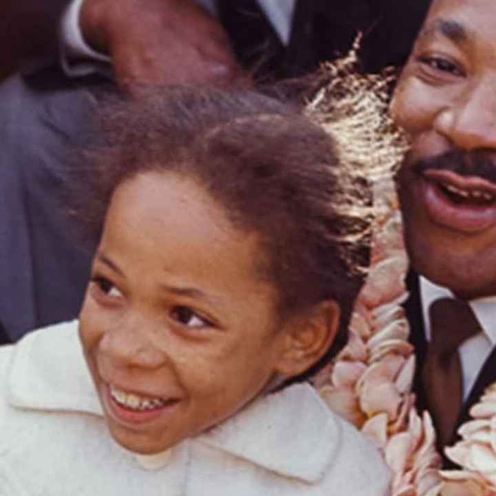 A photo of Sheyann Webb with Dr. Martin Luther King Jr.