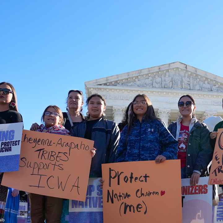 ICWA demonstrators stand outside of the U.S. Supreme Court.