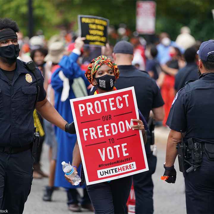 The Capitol Police arrest and escort a demonstrator during the Voters Rights protest on Capitol Hill.